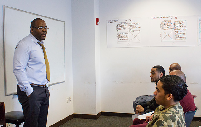 An Employment Services instructor at The Fortune Society teaching participants